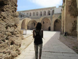 Yael lead us through a courtyard
